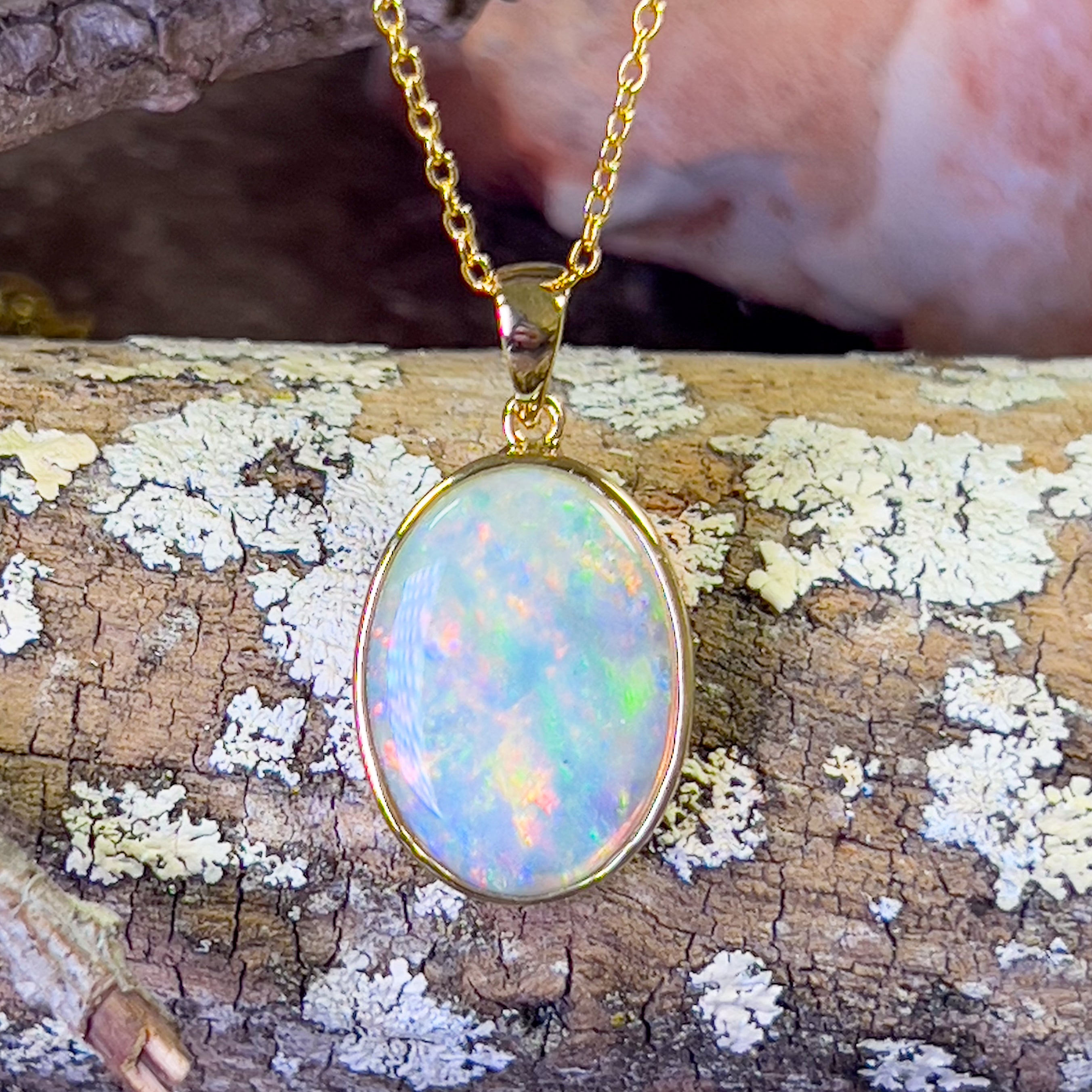 18kt Yellow Gold bezel set Oval Opal pendant – Masterpiece