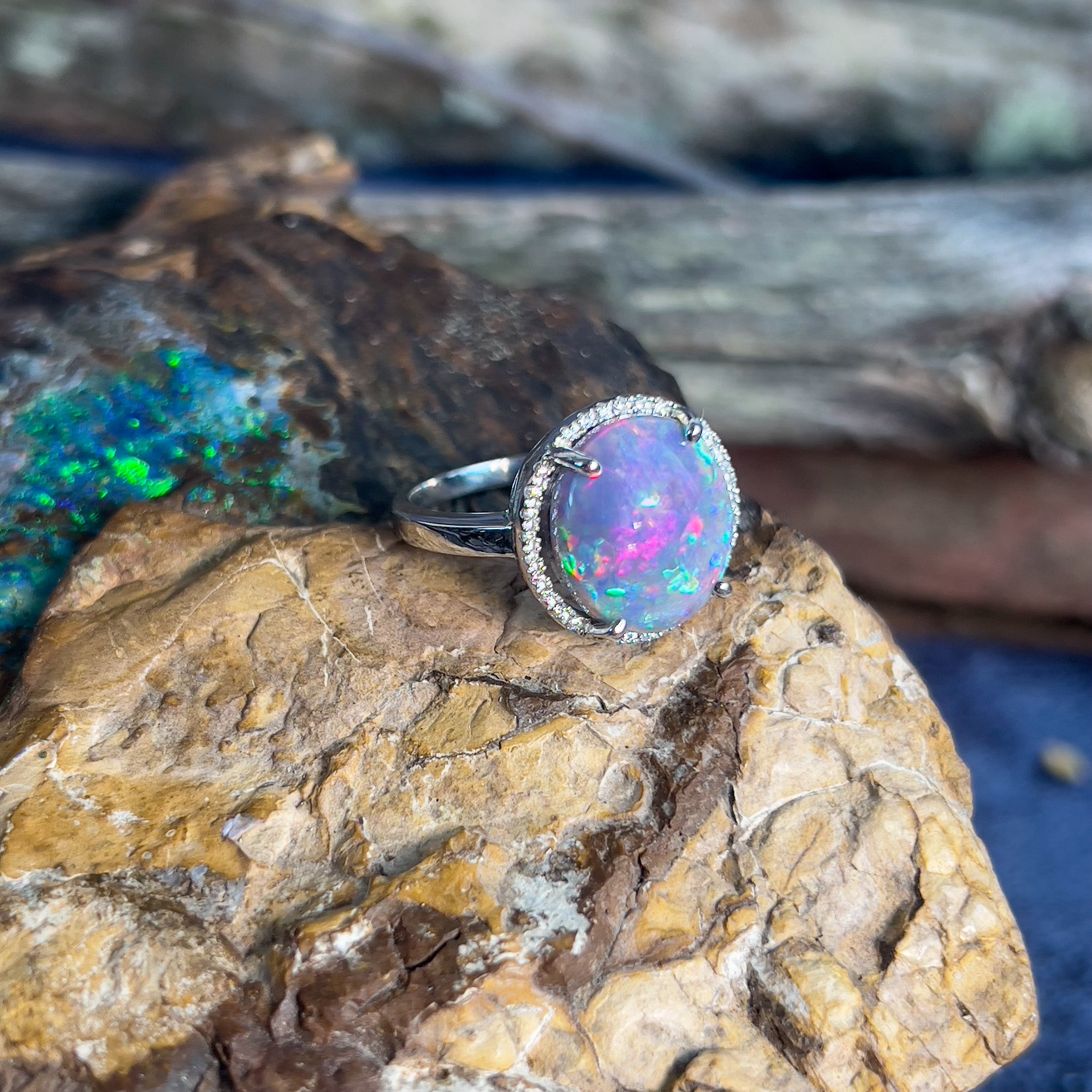 Platinum Halo ring with Black Opal 6.2ct Red flashes and Diamonds - Masterpiece Jewellery Opal & Gems Sydney Australia | Online Shop