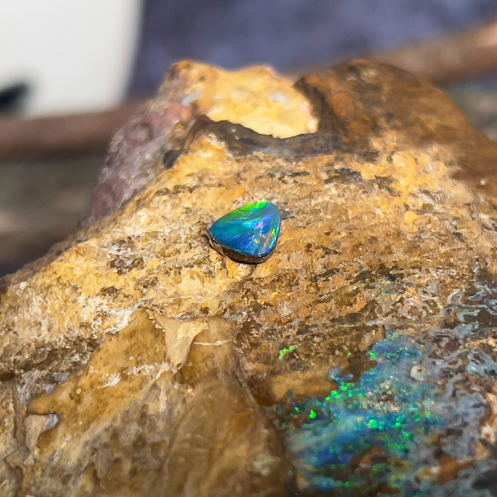 One triangular shape opal doublet 0.9ct - Masterpiece Jewellery Opal & Gems Sydney Australia | Online Shop