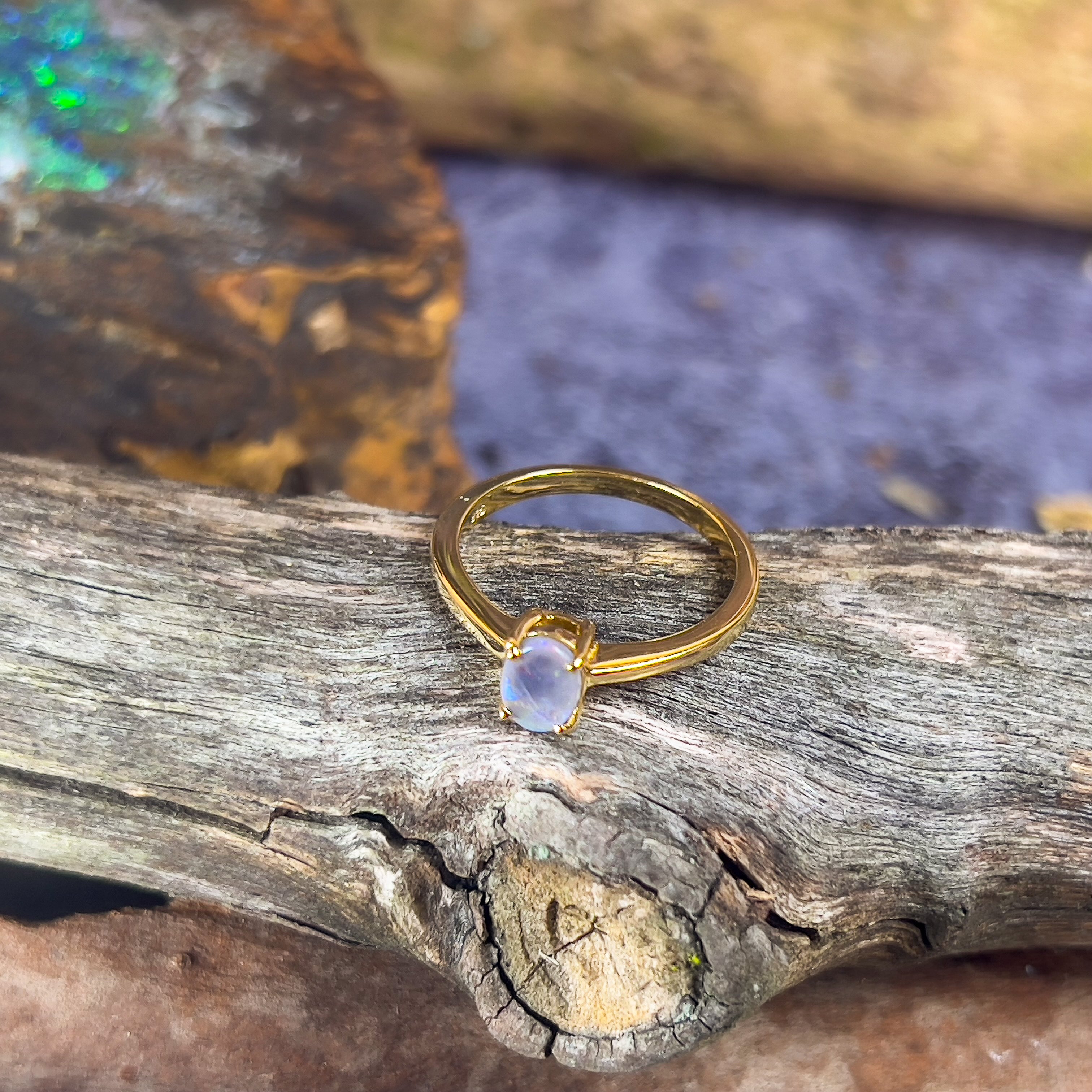 Gold plated sterling silver solitaire 7x5mm Black Opal ring - Masterpiece Jewellery Opal & Gems Sydney Australia | Online Shop