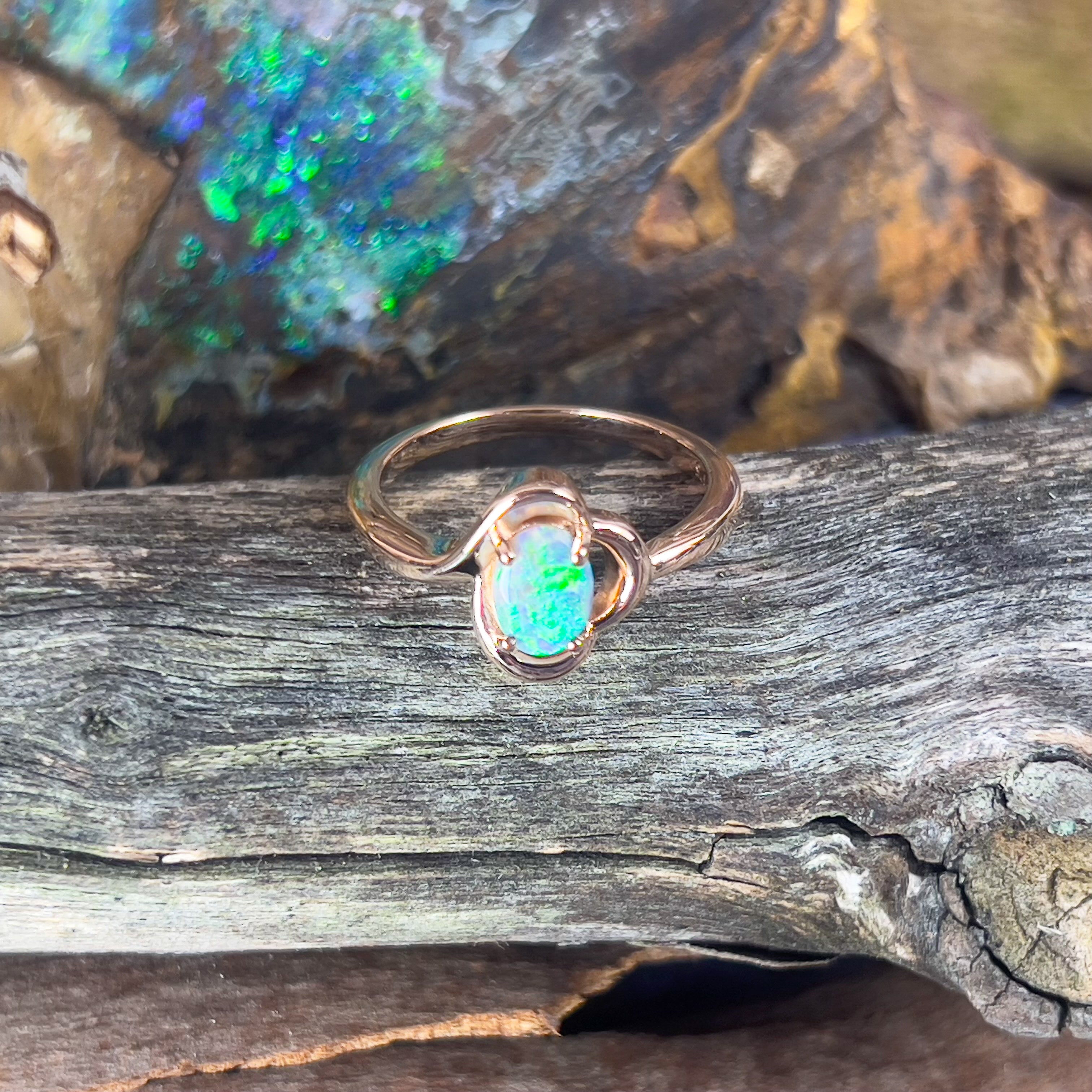 9kt Rose Gold solitaire ring with one Black Opal 0.47ct - Masterpiece Jewellery Opal & Gems Sydney Australia | Online Shop