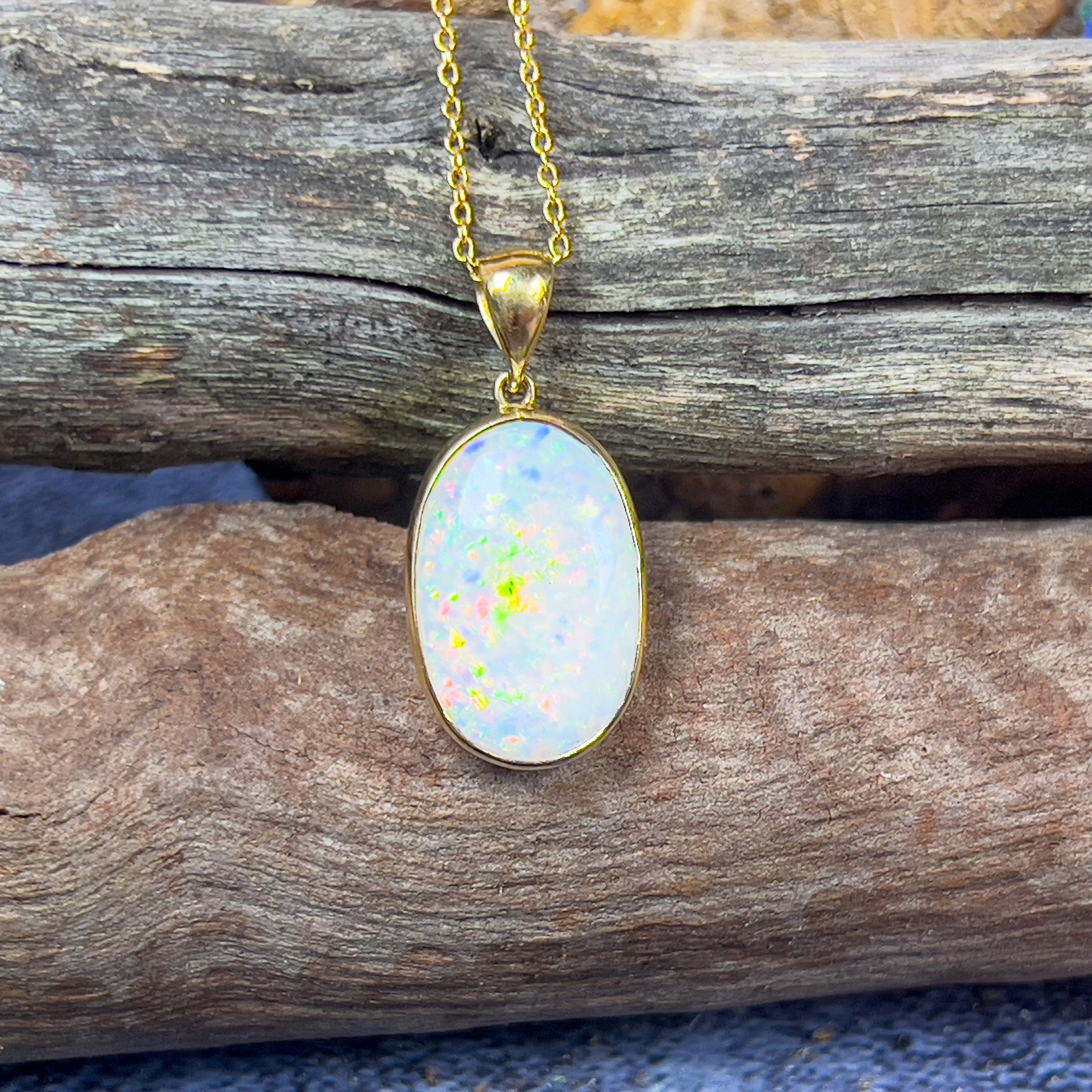 18kt Yellow Gold classic Oval White Opal 6.98ct bezel set pendant - Masterpiece Jewellery Opal & Gems Sydney Australia | Online Shop