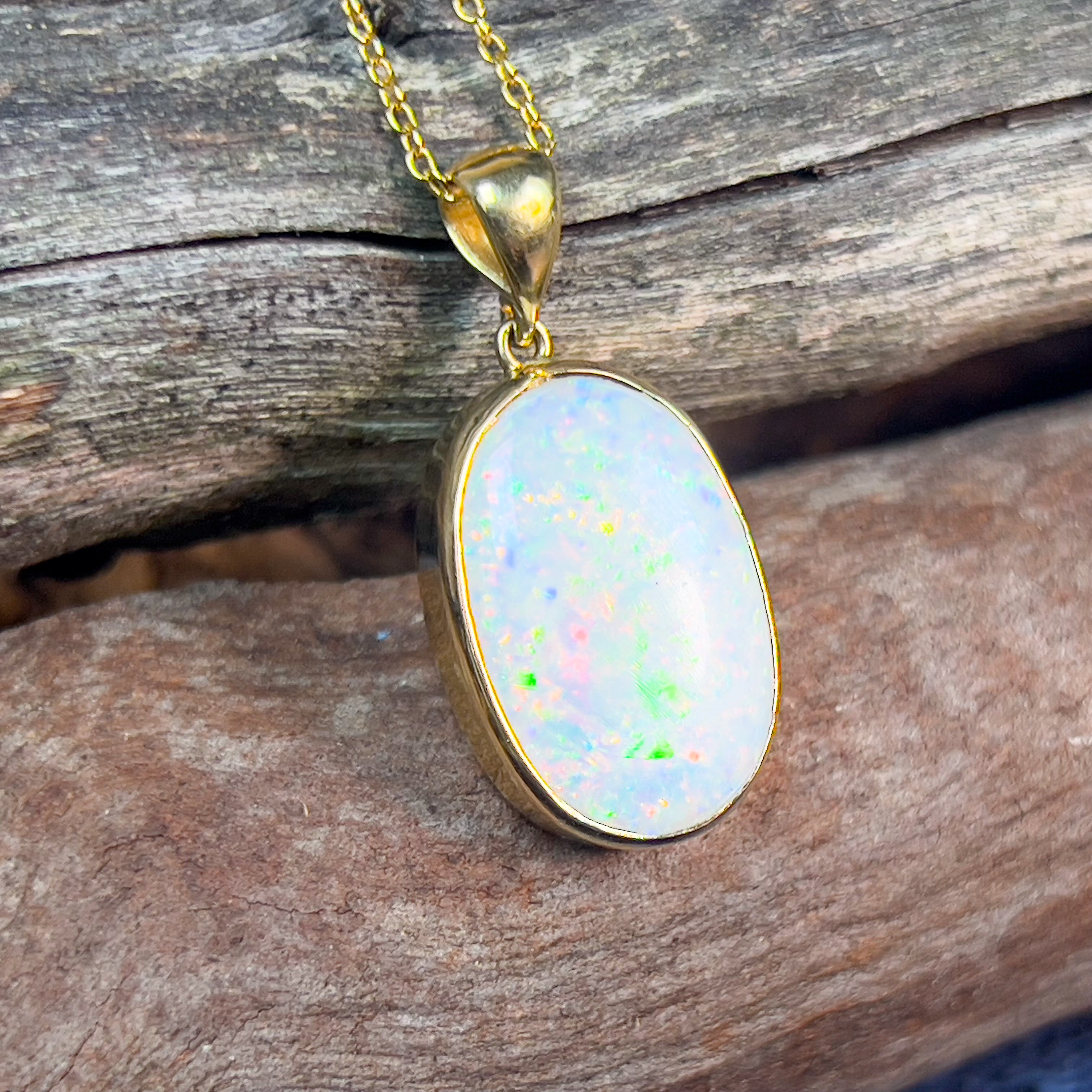 18kt Yellow Gold classic Oval White Opal 6.98ct bezel set pendant - Masterpiece Jewellery Opal & Gems Sydney Australia | Online Shop