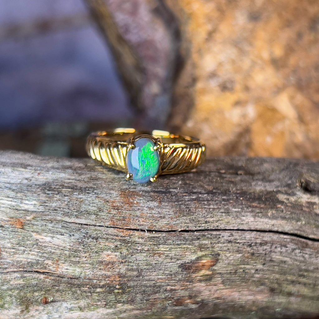 18kt Yellow Gold Black Opal 0.55ct green flash ring - Masterpiece Jewellery Opal & Gems Sydney Australia | Online Shop