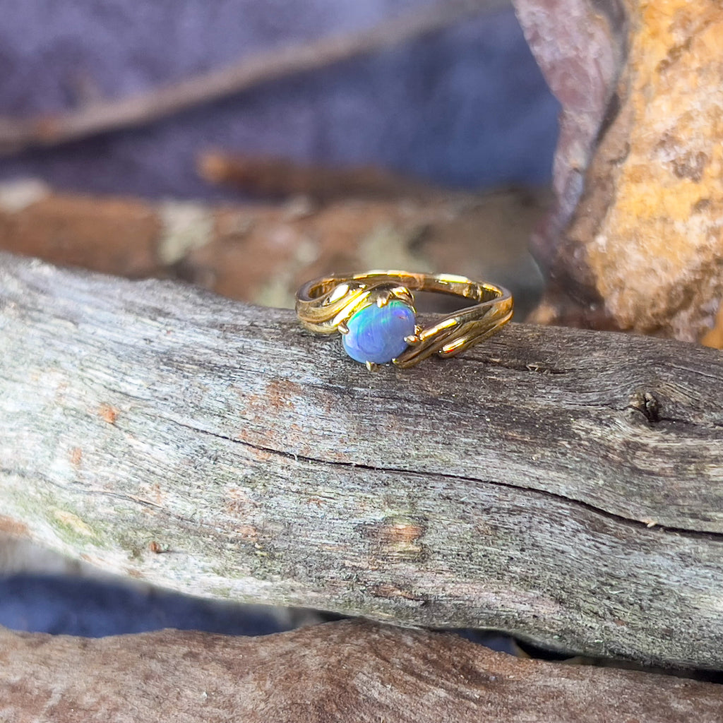 18kt Yellow Gold ring cross over 0.6ct Black Opal - Masterpiece Jewellery Opal & Gems Sydney Australia | Online Shop