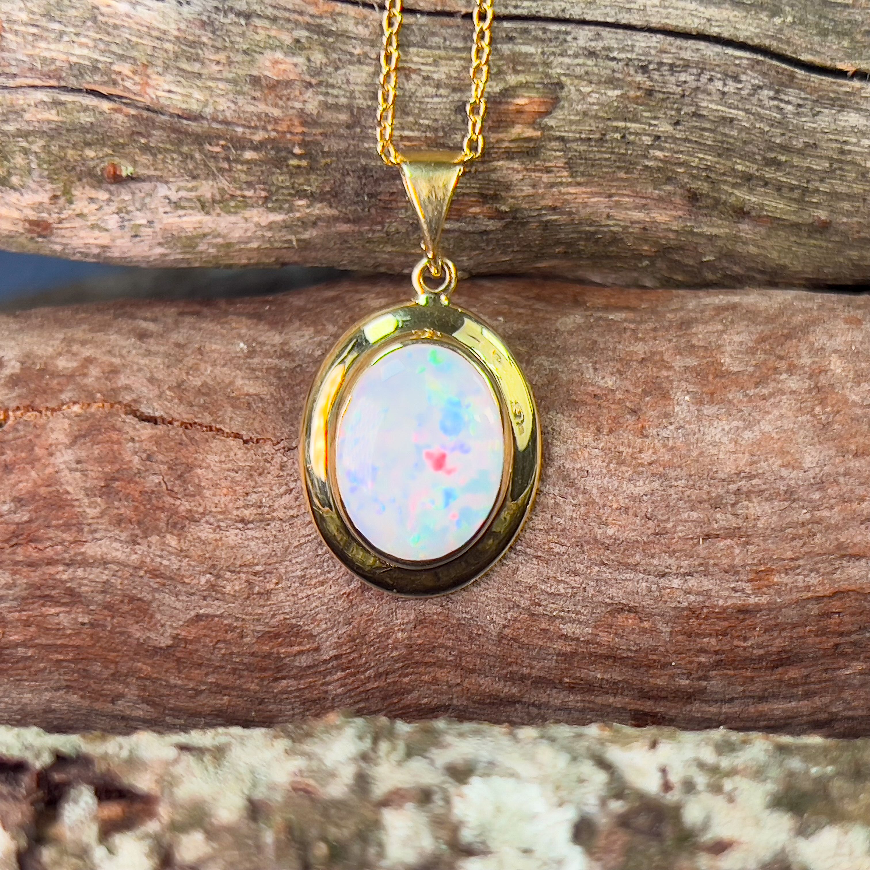 18kt Yellow Gold bezel set oval white opal 2.2ct pendant - Masterpiece Jewellery Opal & Gems Sydney Australia | Online Shop