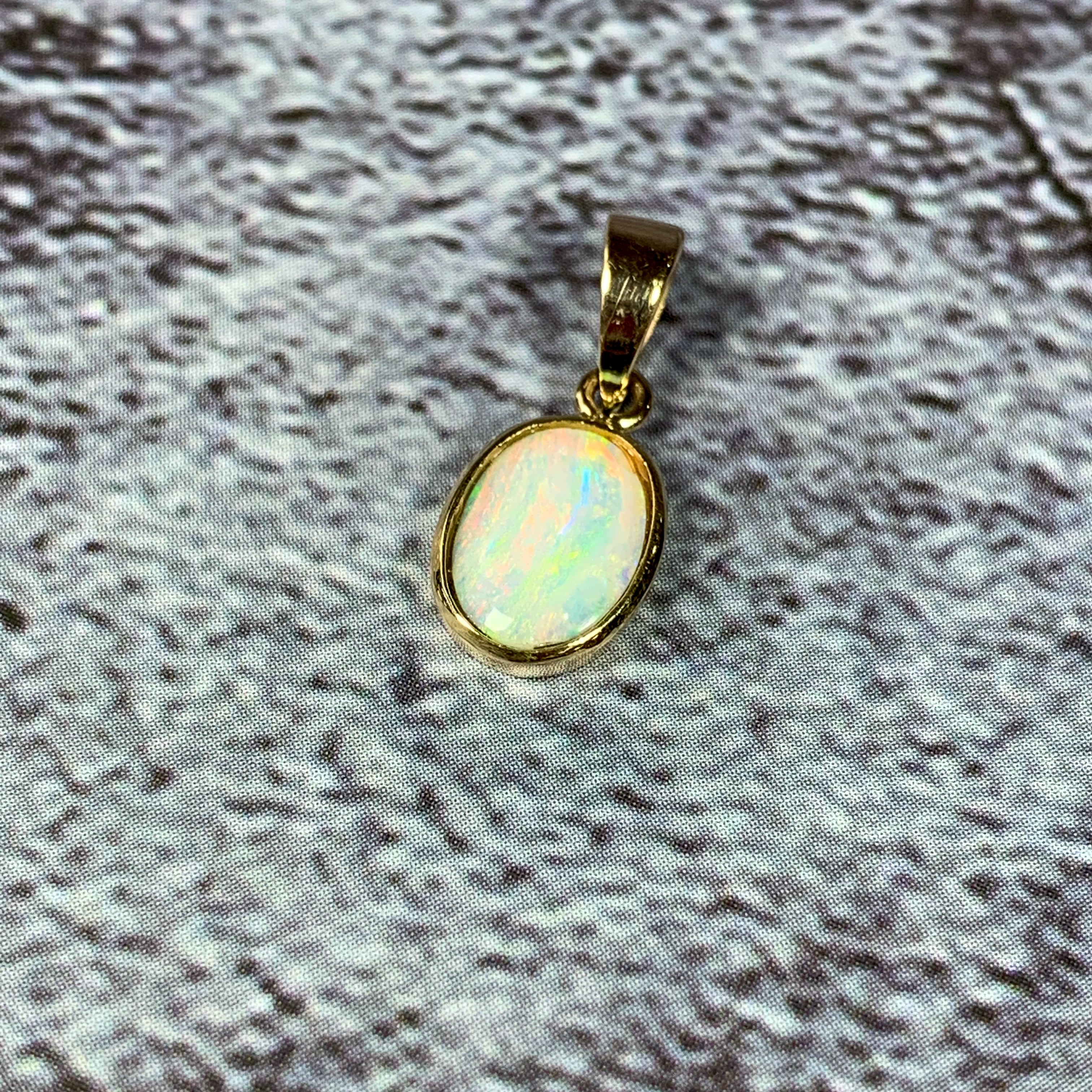 9kt Yellow Gold bezel set pendant 8x6mm White Opal - Masterpiece Jewellery Opal & Gems Sydney Australia | Online Shop