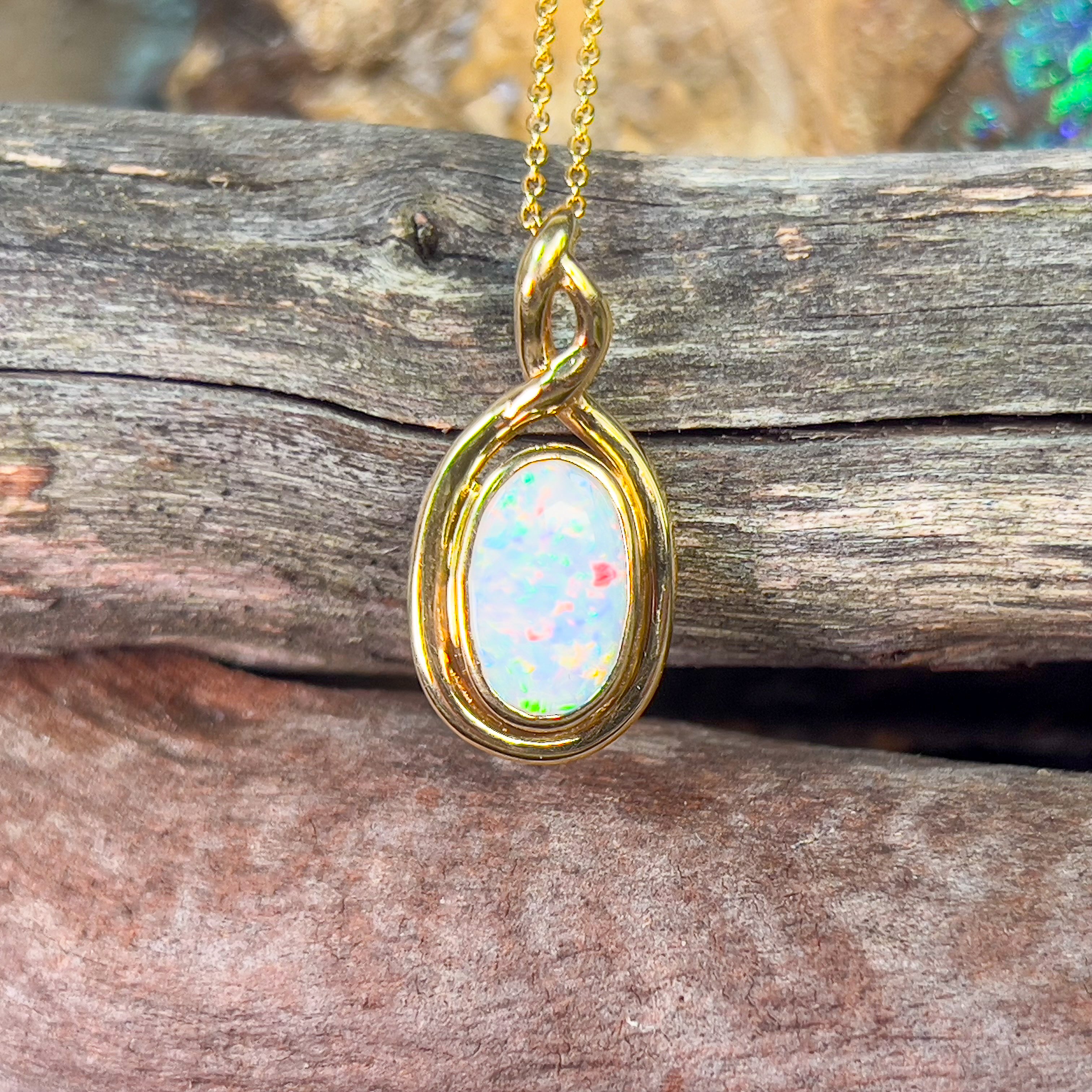 18kt Yellow Gold Oval White Opal 1.2ct pendant - Masterpiece Jewellery Opal & Gems Sydney Australia | Online Shop