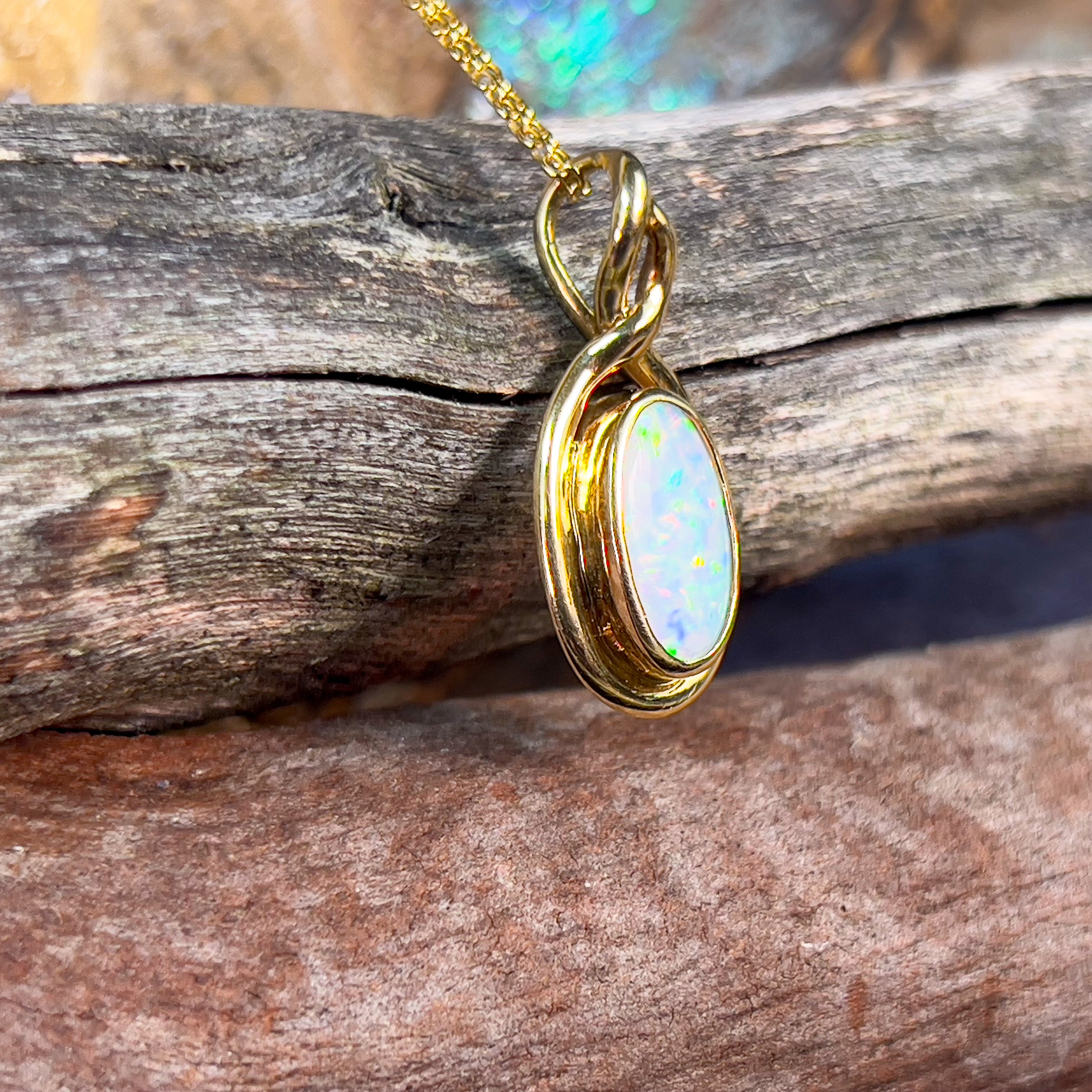 18kt Yellow Gold Oval White Opal 1.2ct pendant - Masterpiece Jewellery Opal & Gems Sydney Australia | Online Shop