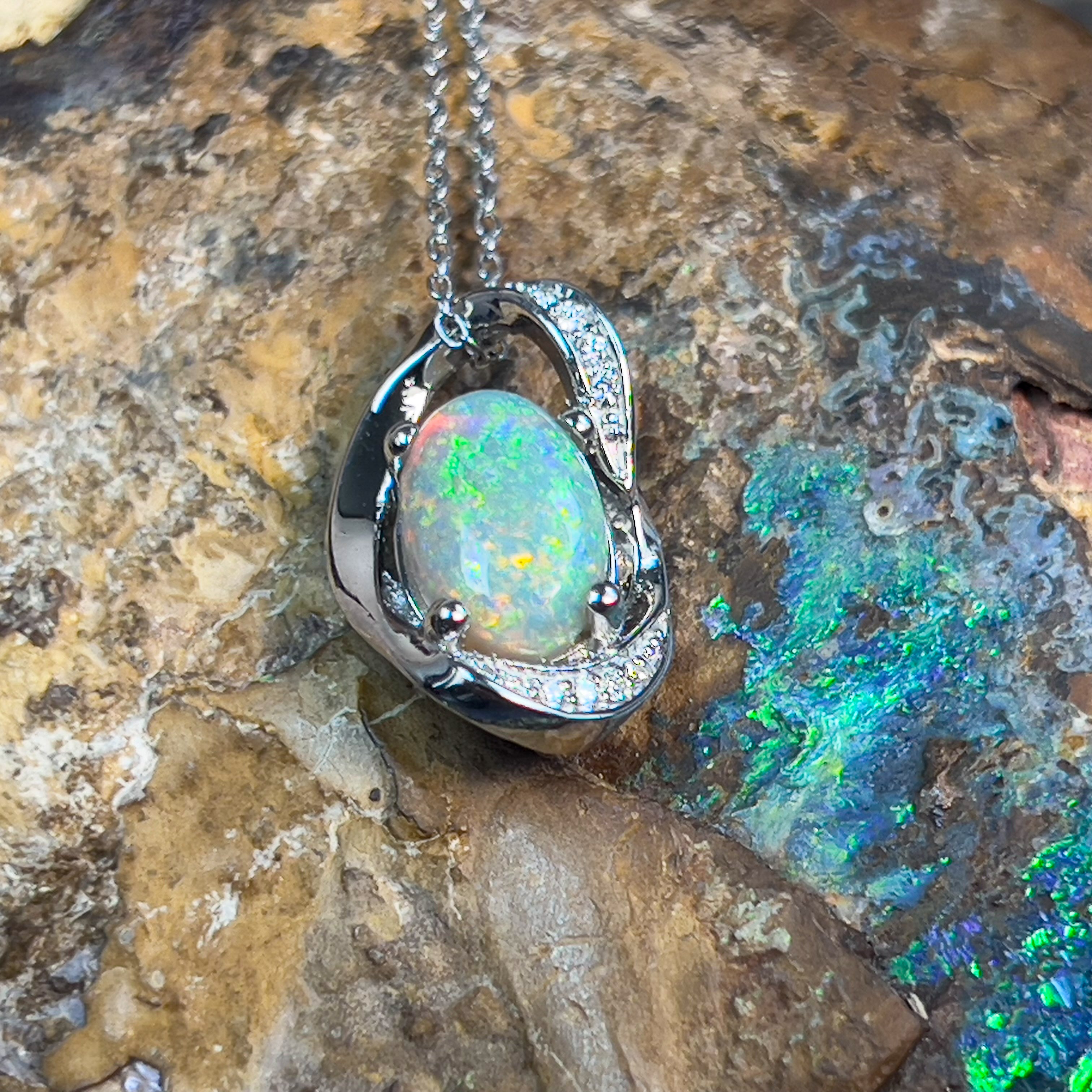 Platinum Pendant with 1.77ct Black Opal and 10 Diamonds - Masterpiece Jewellery Opal & Gems Sydney Australia | Online Shop