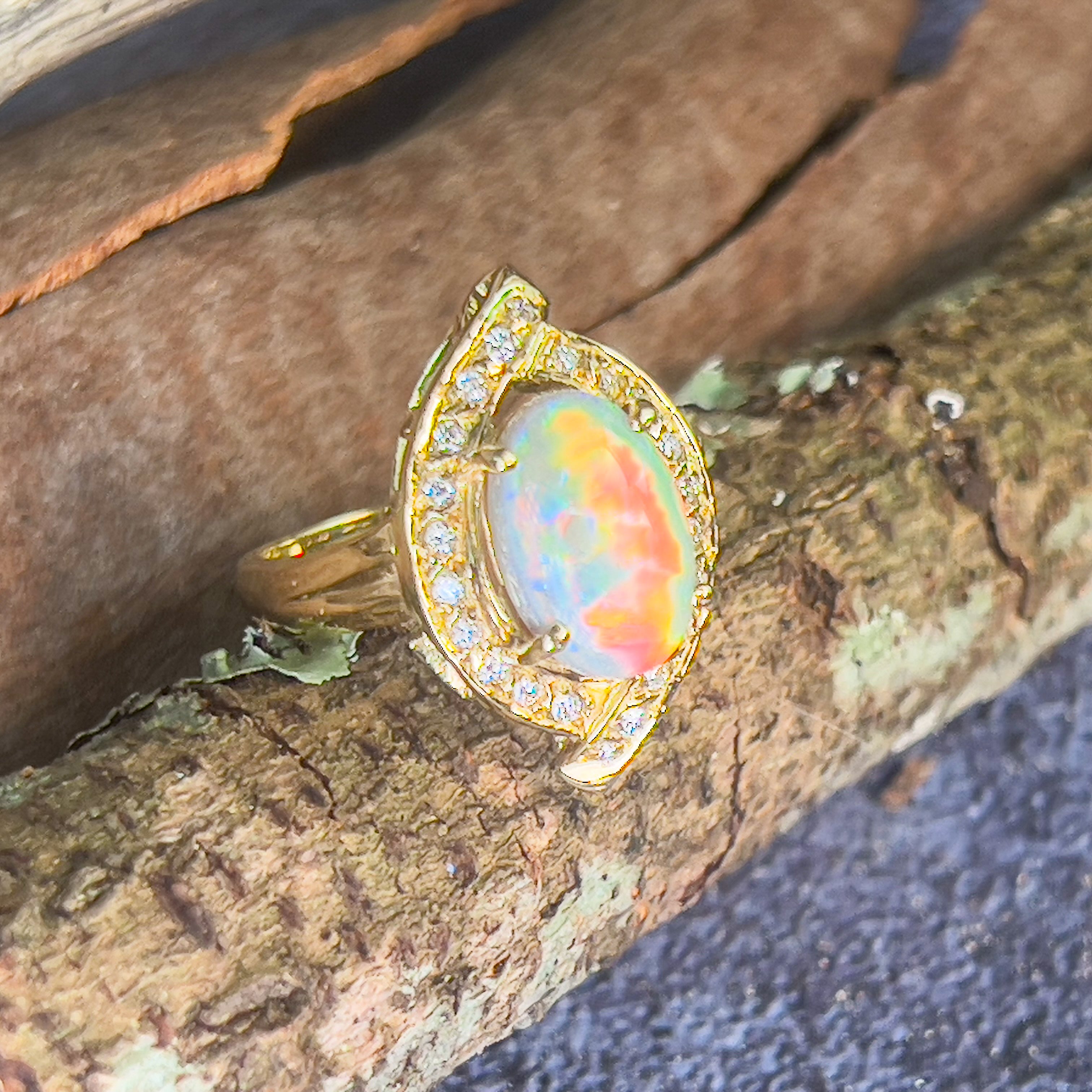 18kt Yellow Gold cluser cross over Black Opal 3.14ct Red flash diamond ring - Masterpiece Jewellery Opal & Gems Sydney Australia | Online Shop