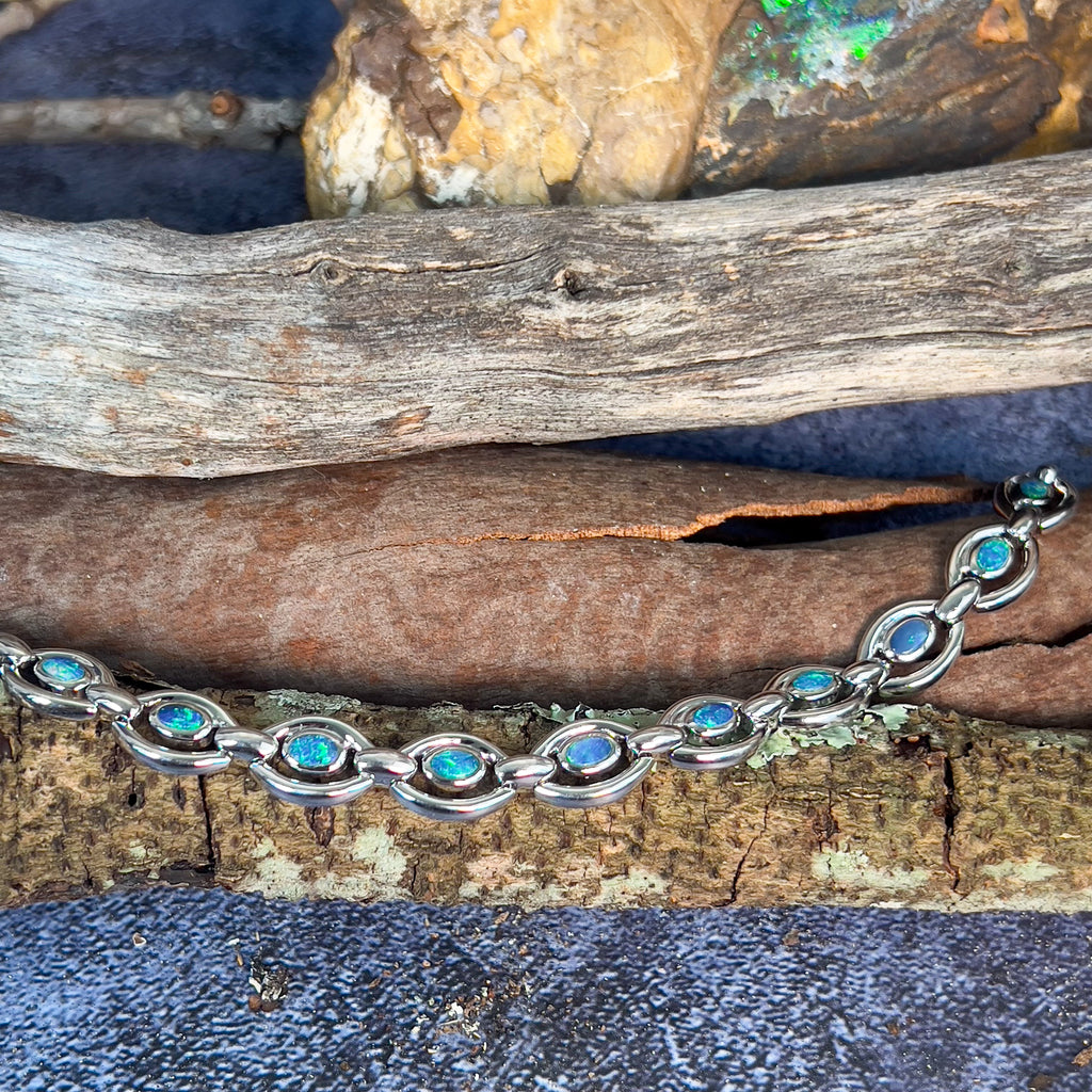 Sterling Silver oval shape framed bracelet with opal doublet - Masterpiece Jewellery Opal & Gems Sydney Australia | Online Shop