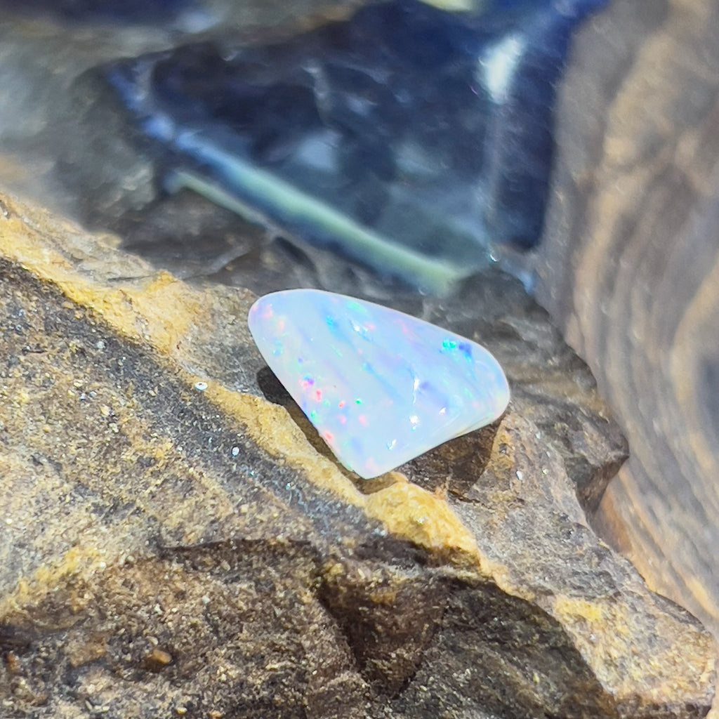 Triangle shape White Opal Red Green blue 3.3ct - Masterpiece Jewellery Opal & Gems Sydney Australia | Online Shop