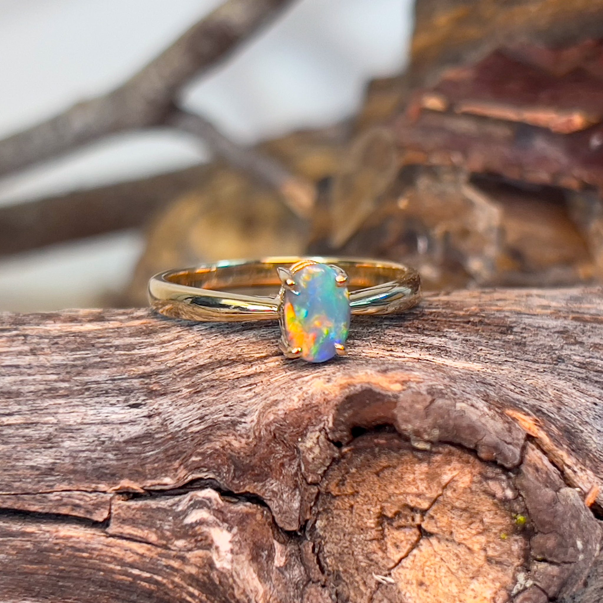 14kt Yellow Gold solitaire ring with one 0.49ct Black Opal - Masterpiece Jewellery Opal & Gems Sydney Australia | Online Shop