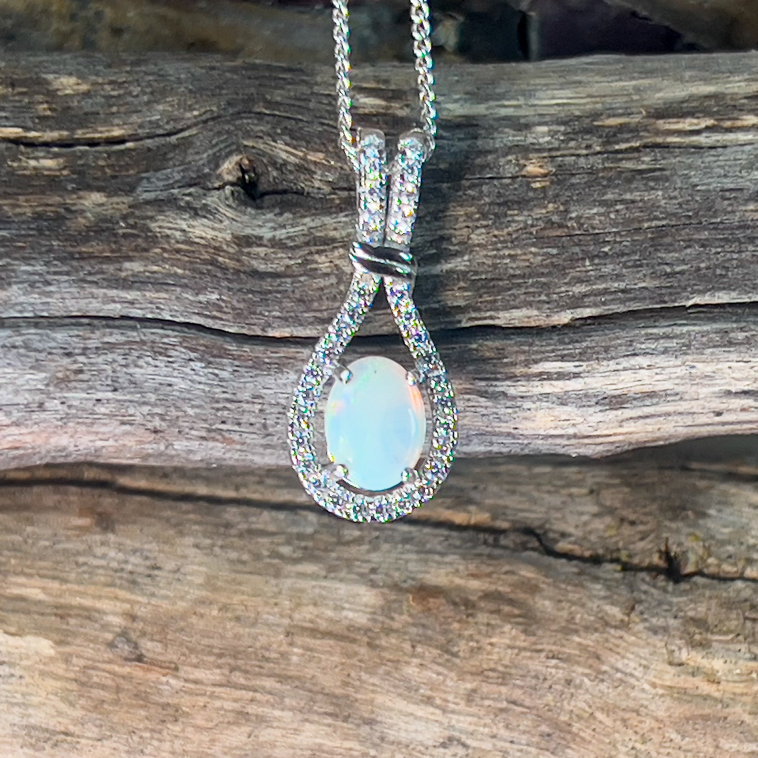 Sterling Silver Swirl loop 8x6mm White Opal pendant - Masterpiece Jewellery Opal & Gems Sydney Australia | Online Shop
