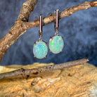 opal huggie earrings
