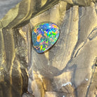 12.8x9.8mm Australian black opal face up, blue and green play of colour with orange flecks