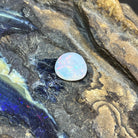 Solid Australian white opal 3.60ct, freeform 12.2x12mm, blue and green with red flashes, loose stone on rock