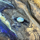 Solid Australian crystal opal 1.00ct, oval 9x6.8mm, red, orange and green flashes, loose stone on rock