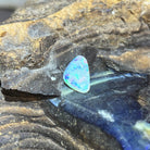 Triangular 13x8mm solid Australian crystal opal, 1.36ct, green, red and blue, unset stone on rock