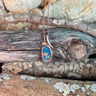 oval Australian opal doublet pendant in rose gold-plated silver, yellow, red, blue and green play-of-colour
