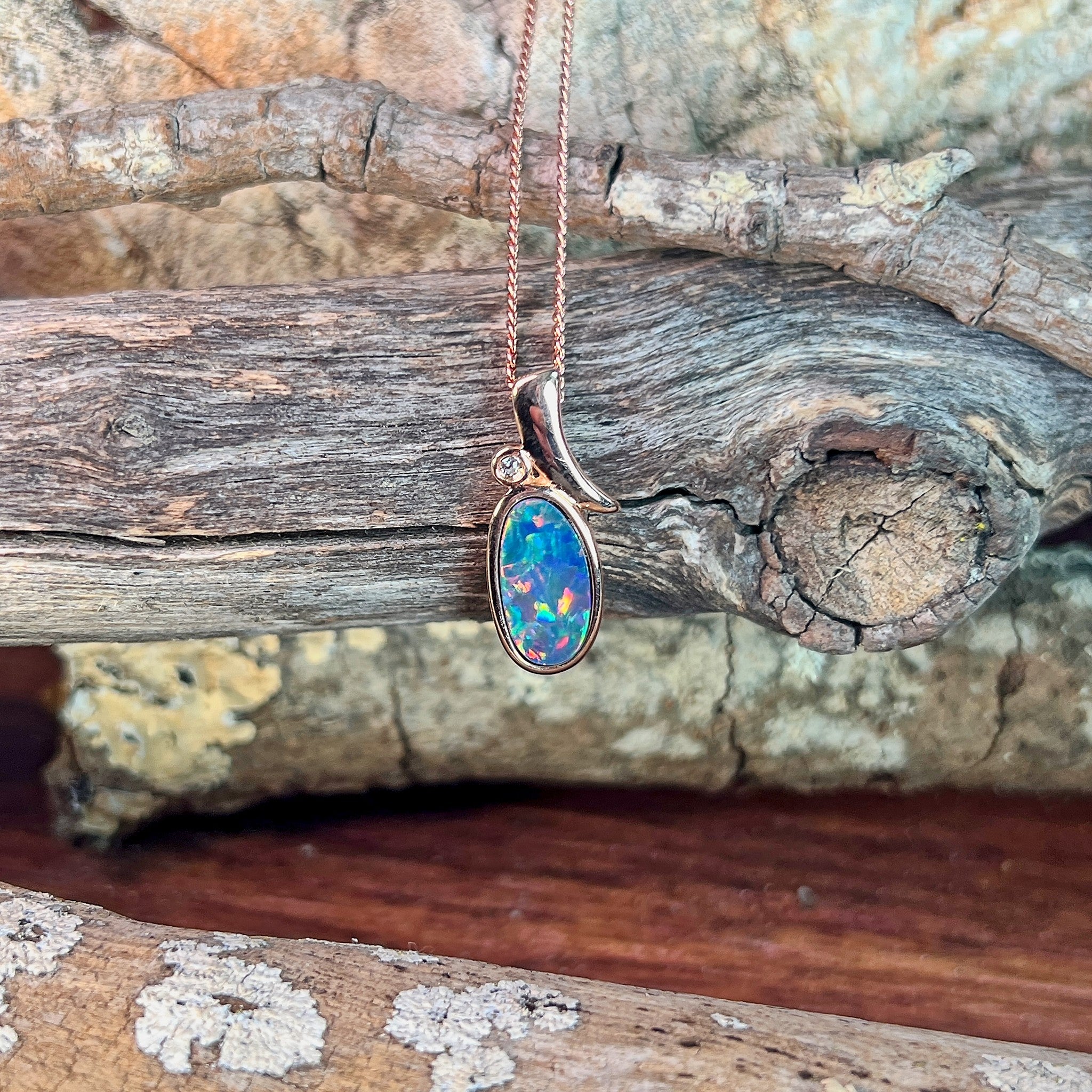 13 x 7mm Australian opal doublet pendant in rose gold-plated silver, yellow, red, blue and green
