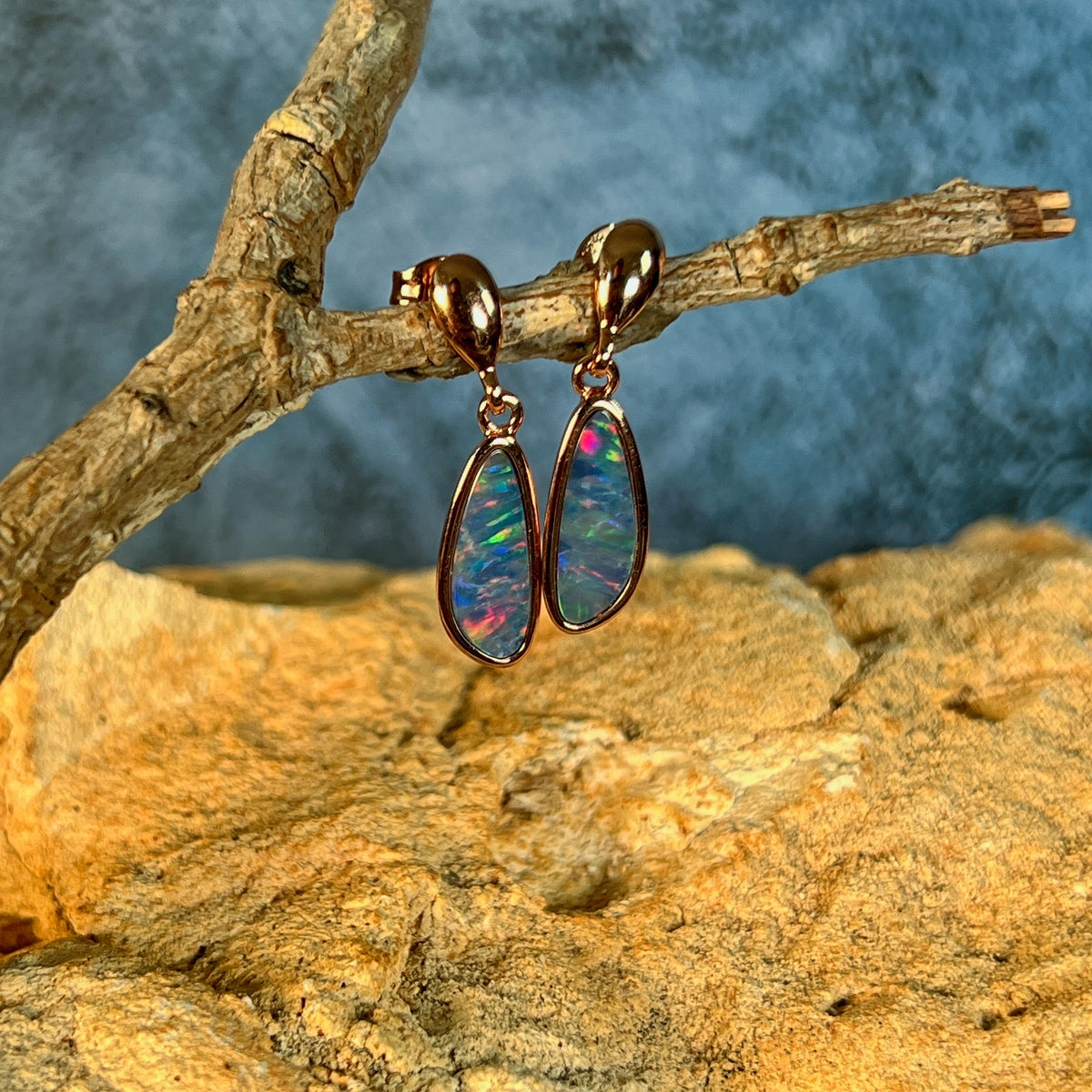 13 x 5mm Australian opal doublet earrings in rose gold-plated silver, violet, red, green and blue