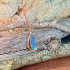 rose gold-plated silver Australian opal doublet pendant with a 16.5 x 5.5mm pear-shaped stone