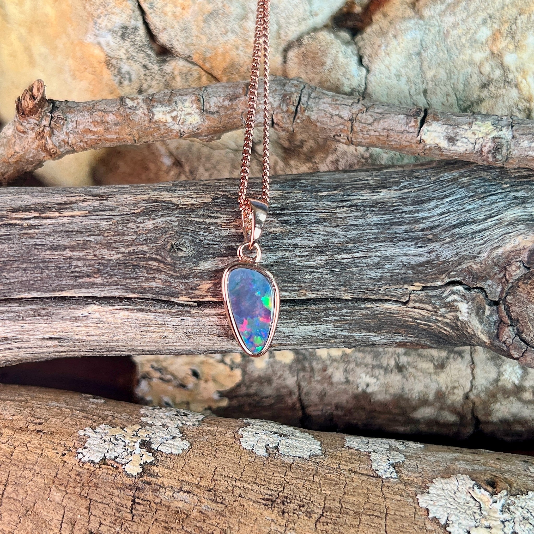 12 x 6.5mm Australian opal doublet pendant in rose gold-plated silver, red, green and blue