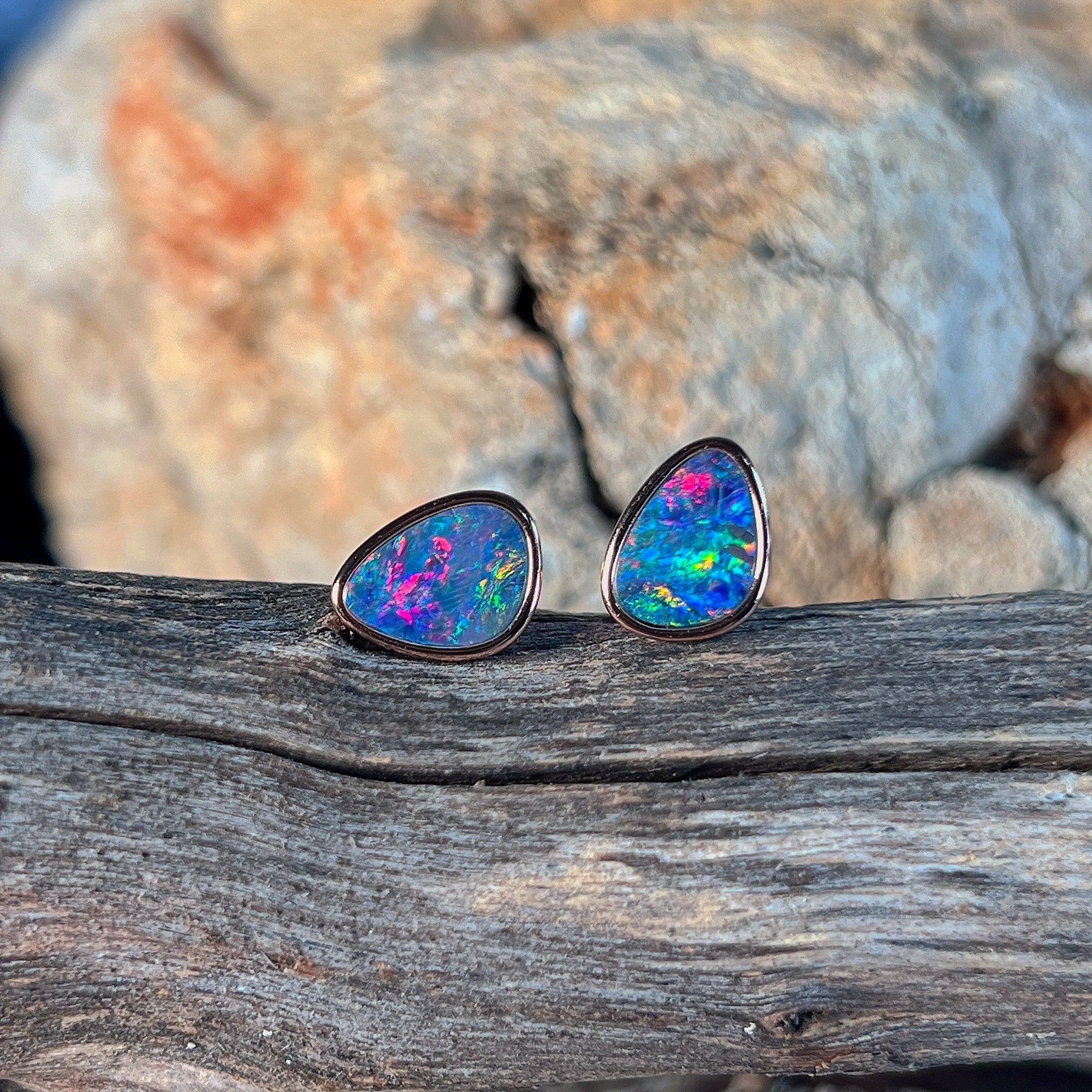 Australian opal doublet earrings, rose gold-plated silver, 10 x 8mm stones showing red, blue and green