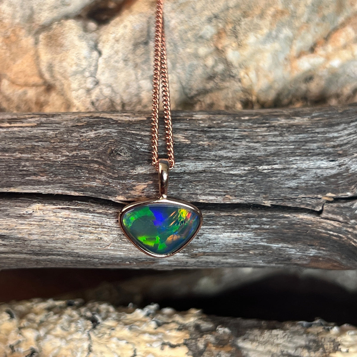9 x 11mm Australian opal triplet pendant in rose gold-plated silver, red, blue, green and yellow