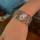 Sterling silver opal inlay cuff on the wrist, 26mm wide