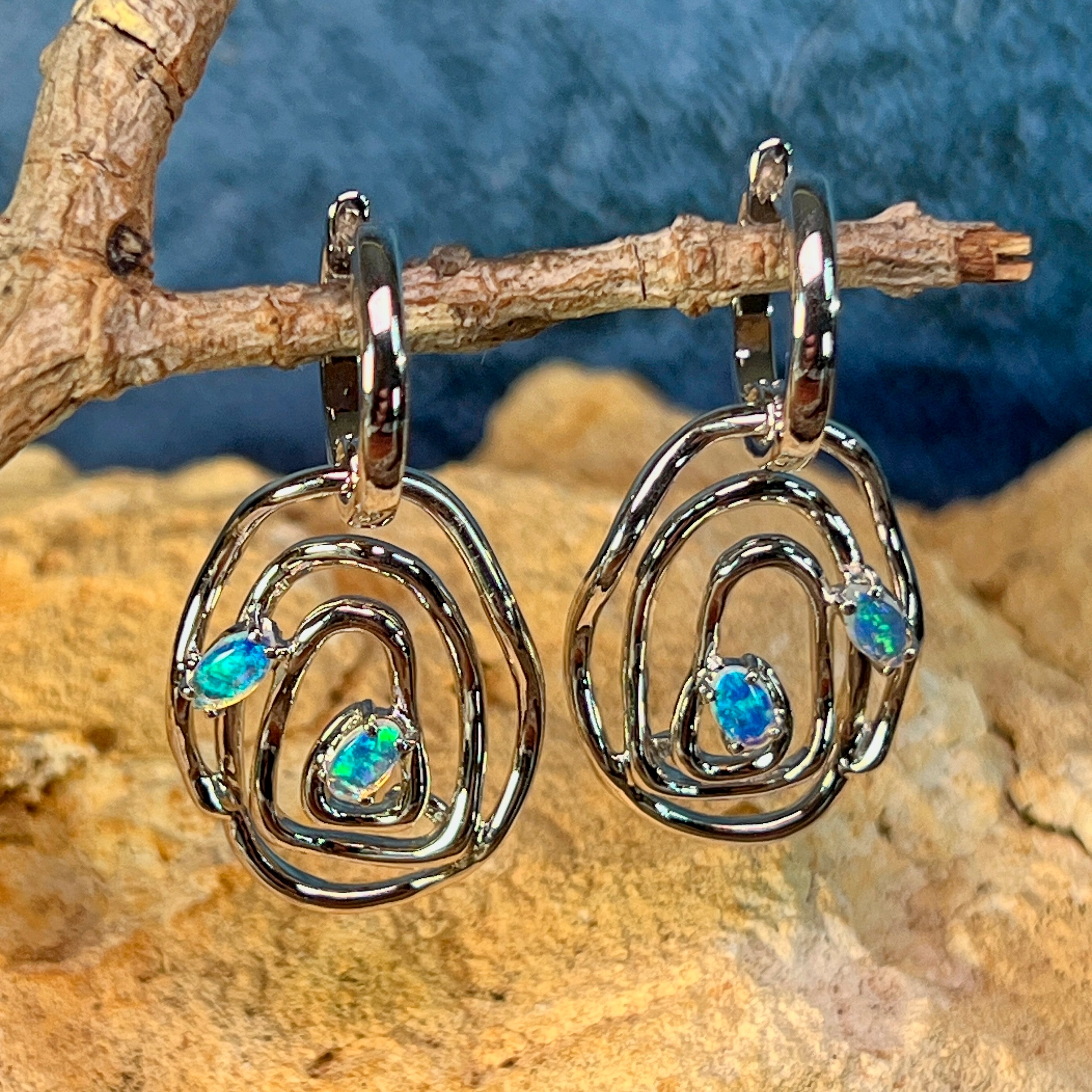 Australian opal set into the sterling silver circle earring design