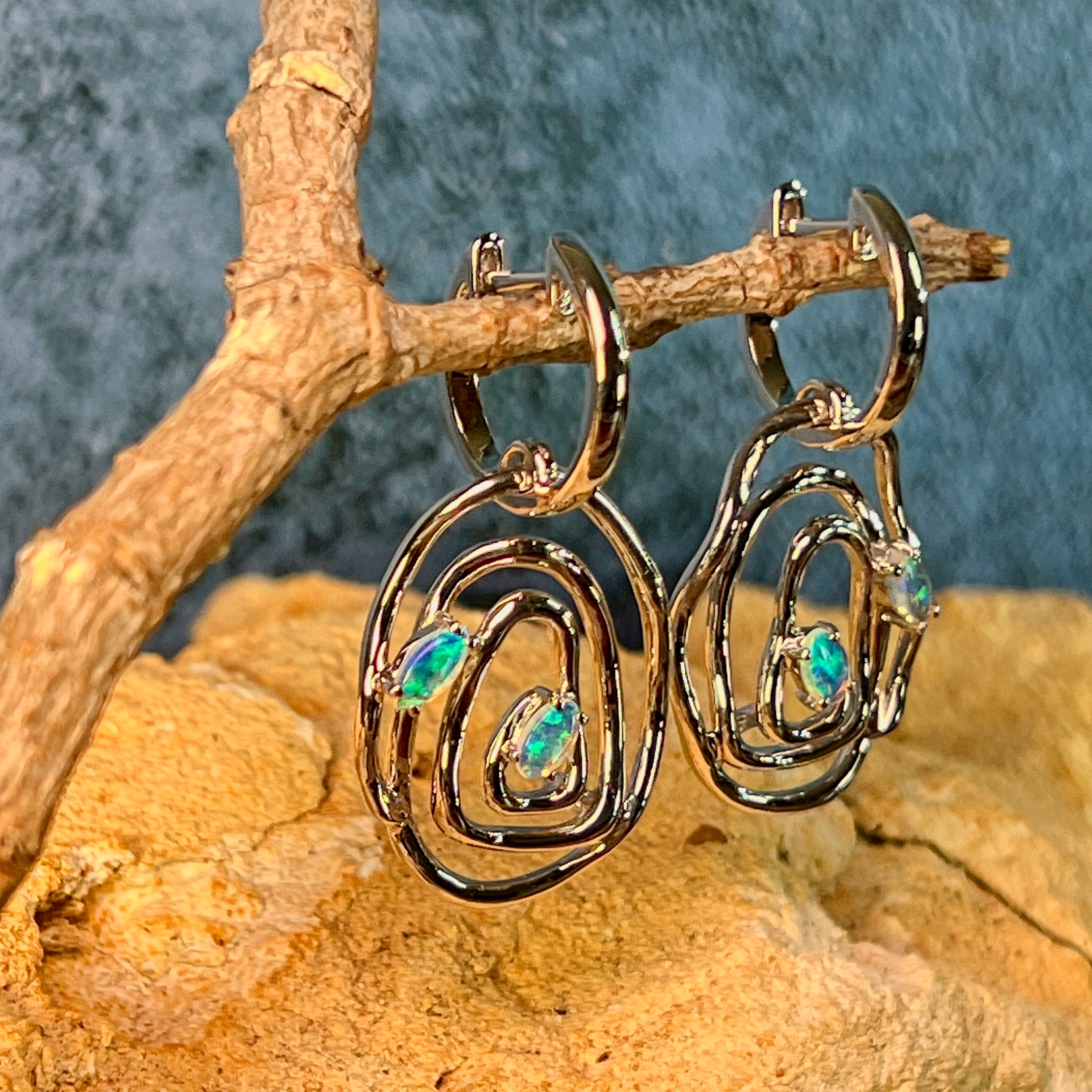 Close view of the Australian opal in the sterling silver circle earrings