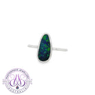 Freeform opal doublet bezel-set solitaire ring in sterling silver with blue and green colour