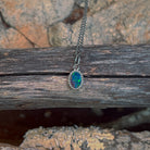 oval Australian opal doublet pendant in sterling silver, red, blue and green play-of-colour