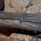 sterling silver Australian opal doublet pendant with a 7 x 5mm oval stone
