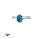 Oval opal doublet ring in sterling silver with cubic zirconia set along each shoulder, showing blue, red and green play of colour