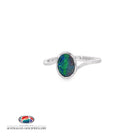 Oval opal doublet bezel-set solitaire ring on a curved sterling silver shank, showing blue, red and green play of colour