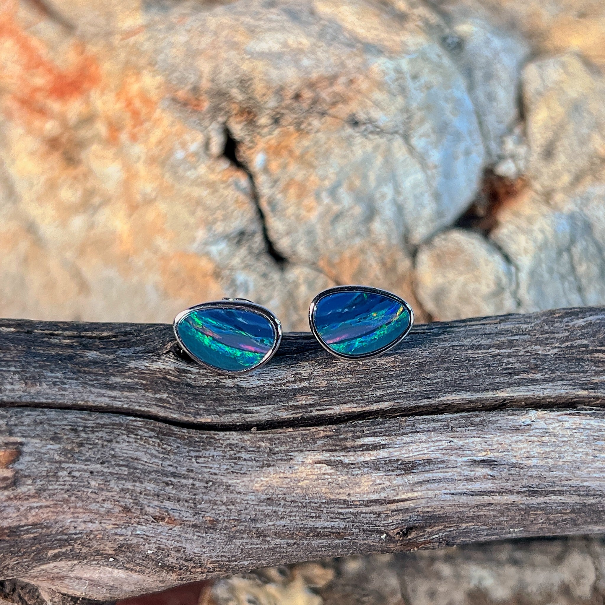 triangular Australian opal doublet earrings in sterling silver, red, blue and green play-of-colour