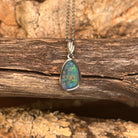 freeform Australian opal triplet pendant in sterling silver, blue, green and yellow play-of-colour