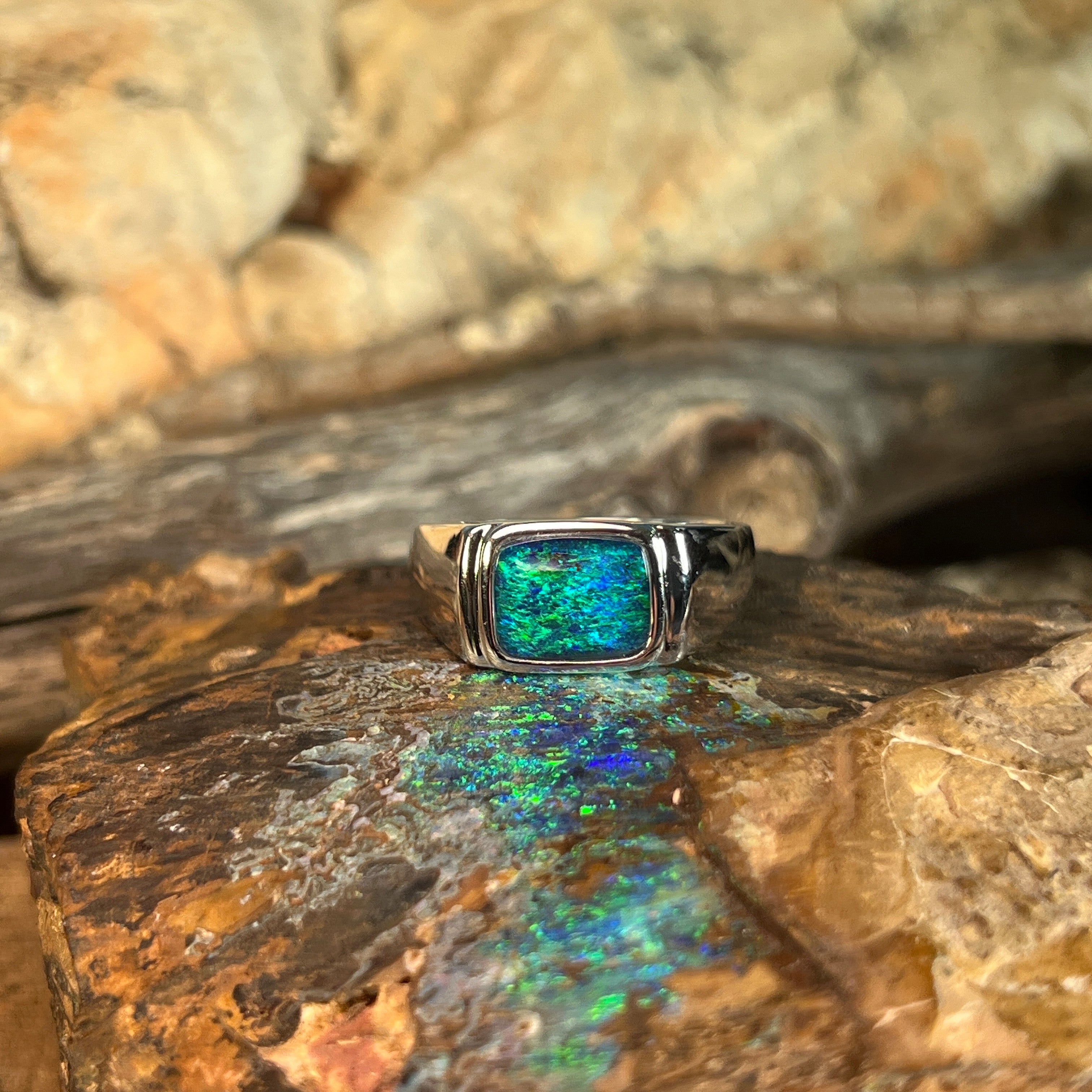 blue and green play-of-colour in a 11 x 8mm rectangular Australian opal triplet ring