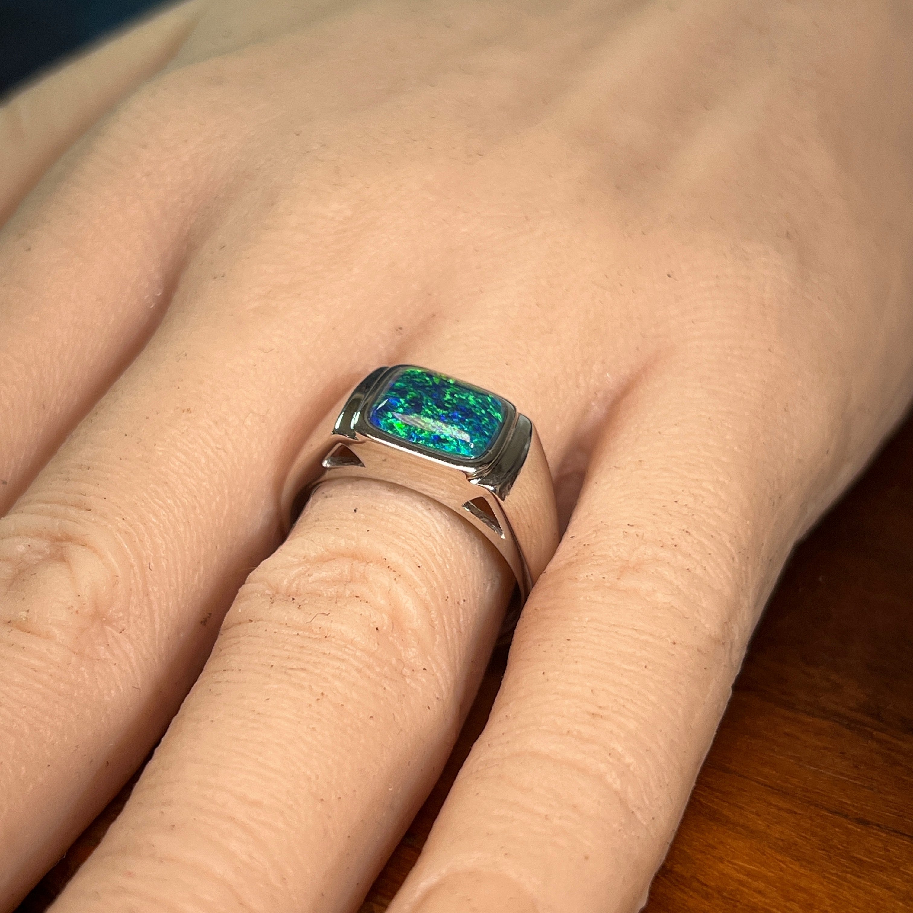 11 x 8mm rectangular Australian opal triplet ring on the hand, sterling silver