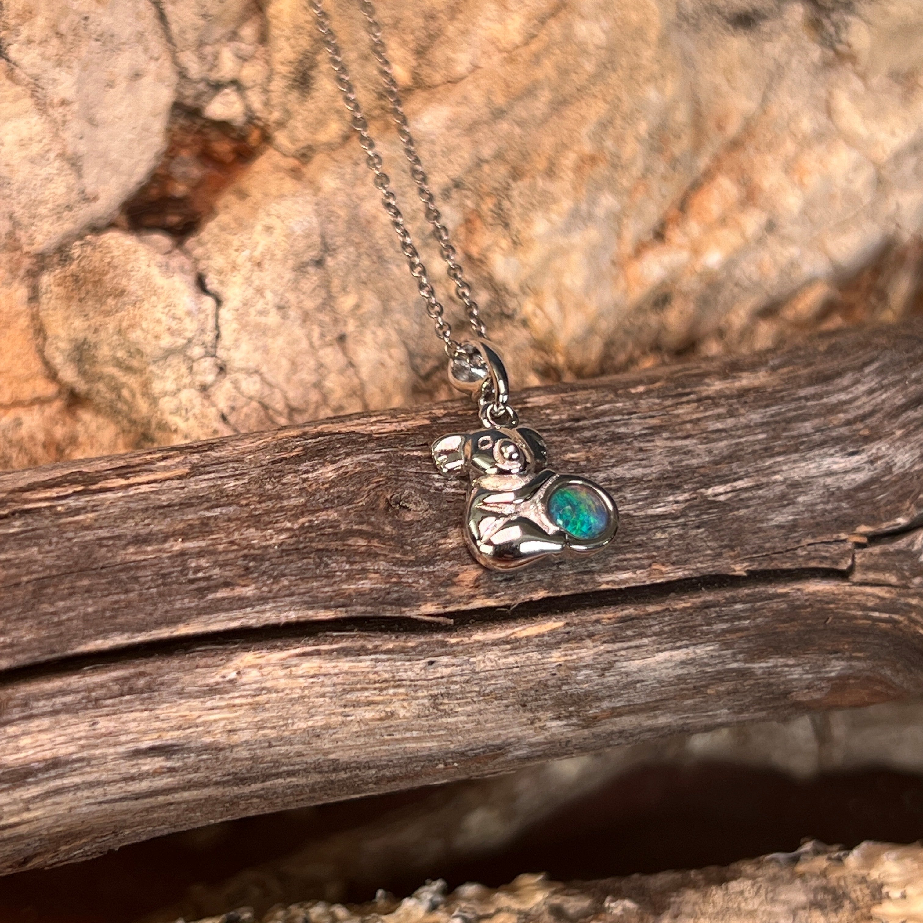 sterling silver Australian opal triplet pendant with a 5mm round stone