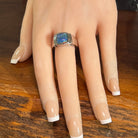 Worn Australian opal triplet ring in sterling silver, yellow, orange, blue and green, 10mm
