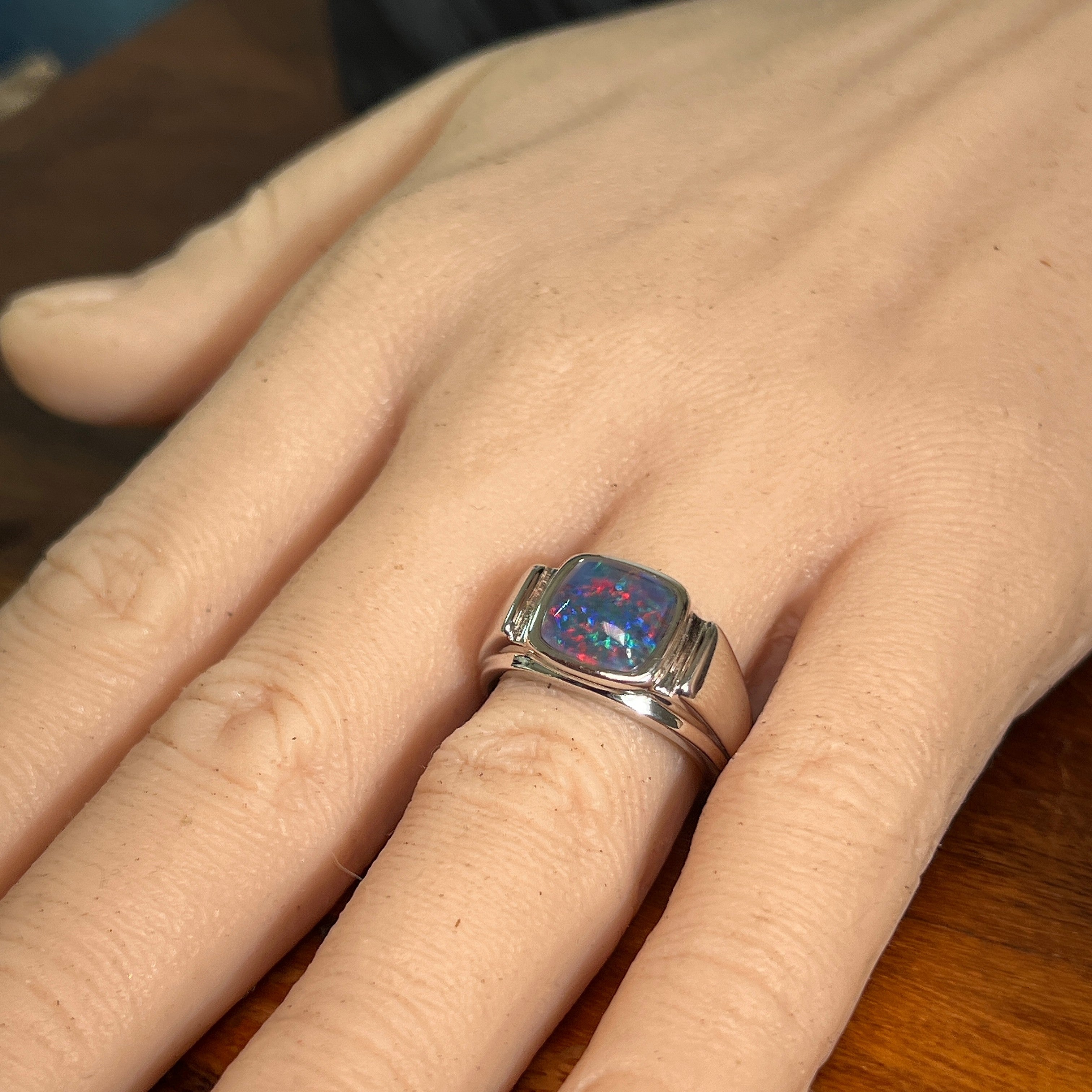 Worn Australian opal triplet ring in sterling silver, red, blue and green, 10mm