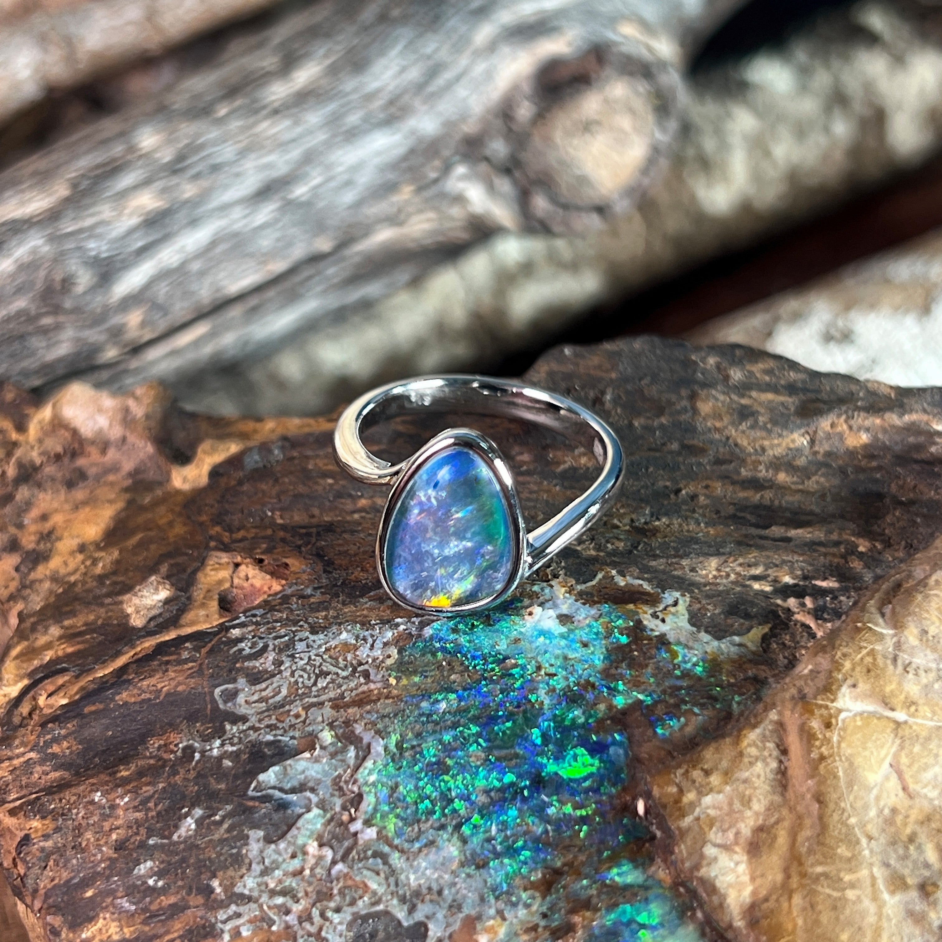 Australian opal triplet ring, sterling silver, 12 x 9mm stone showing red, yellow, blue and green