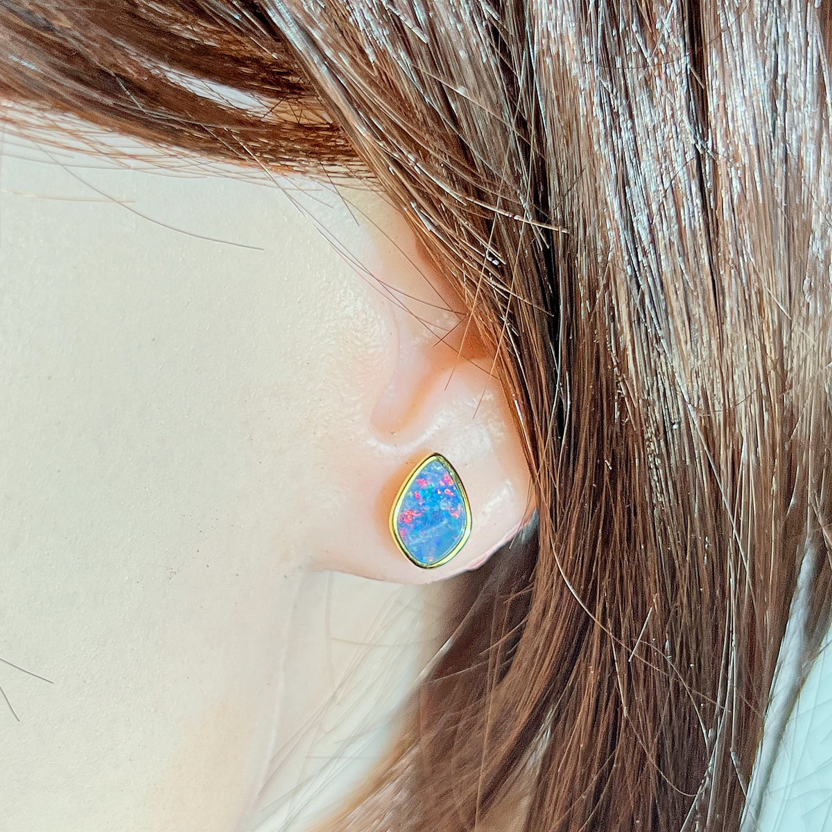 Australian opal doublet earrings worn on the ear, yellow gold-plated silver, 11 x 7.5mm freeform stones