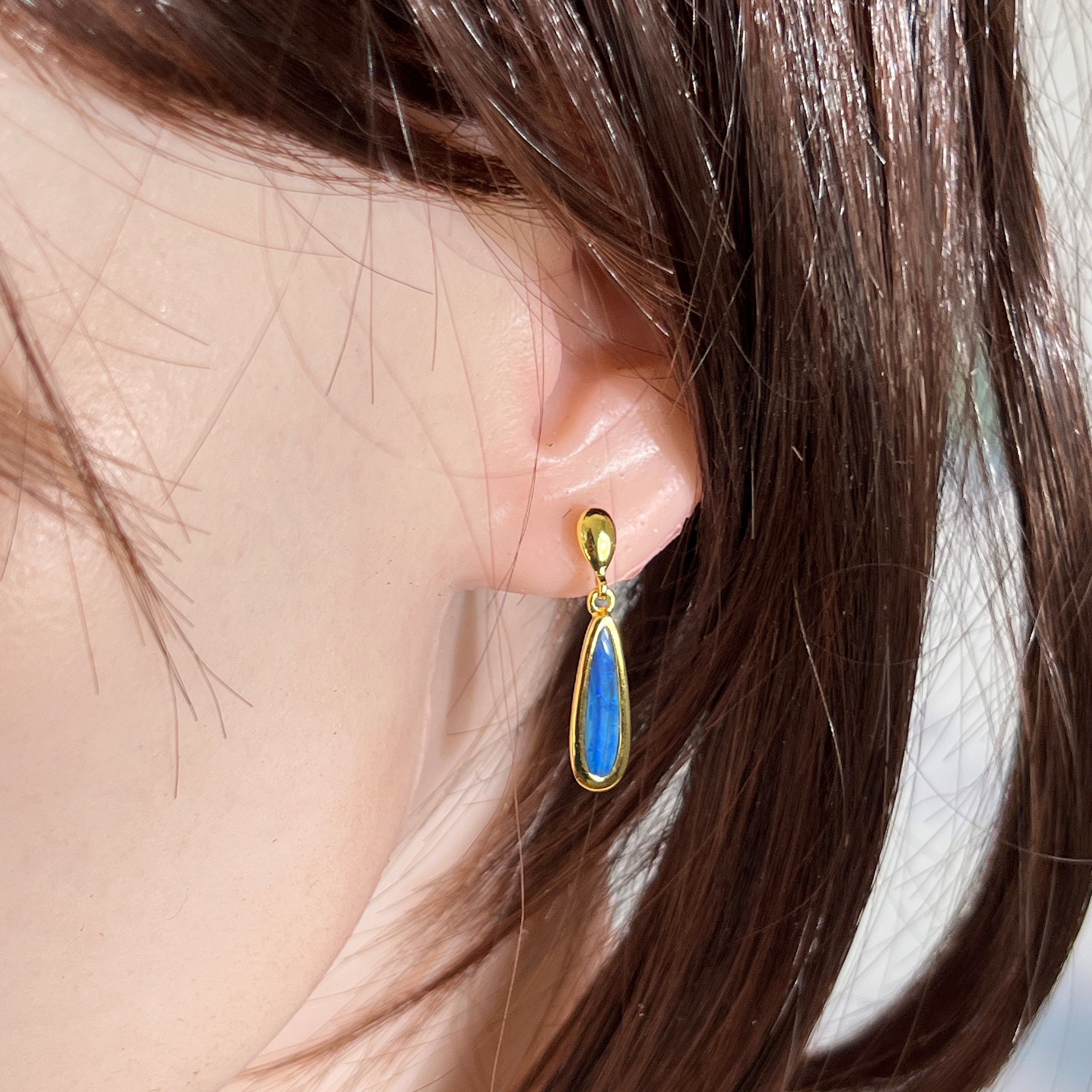 Australian opal doublet earrings worn on the ear, yellow gold-plated silver, 17 x 5mm pear-shaped stones