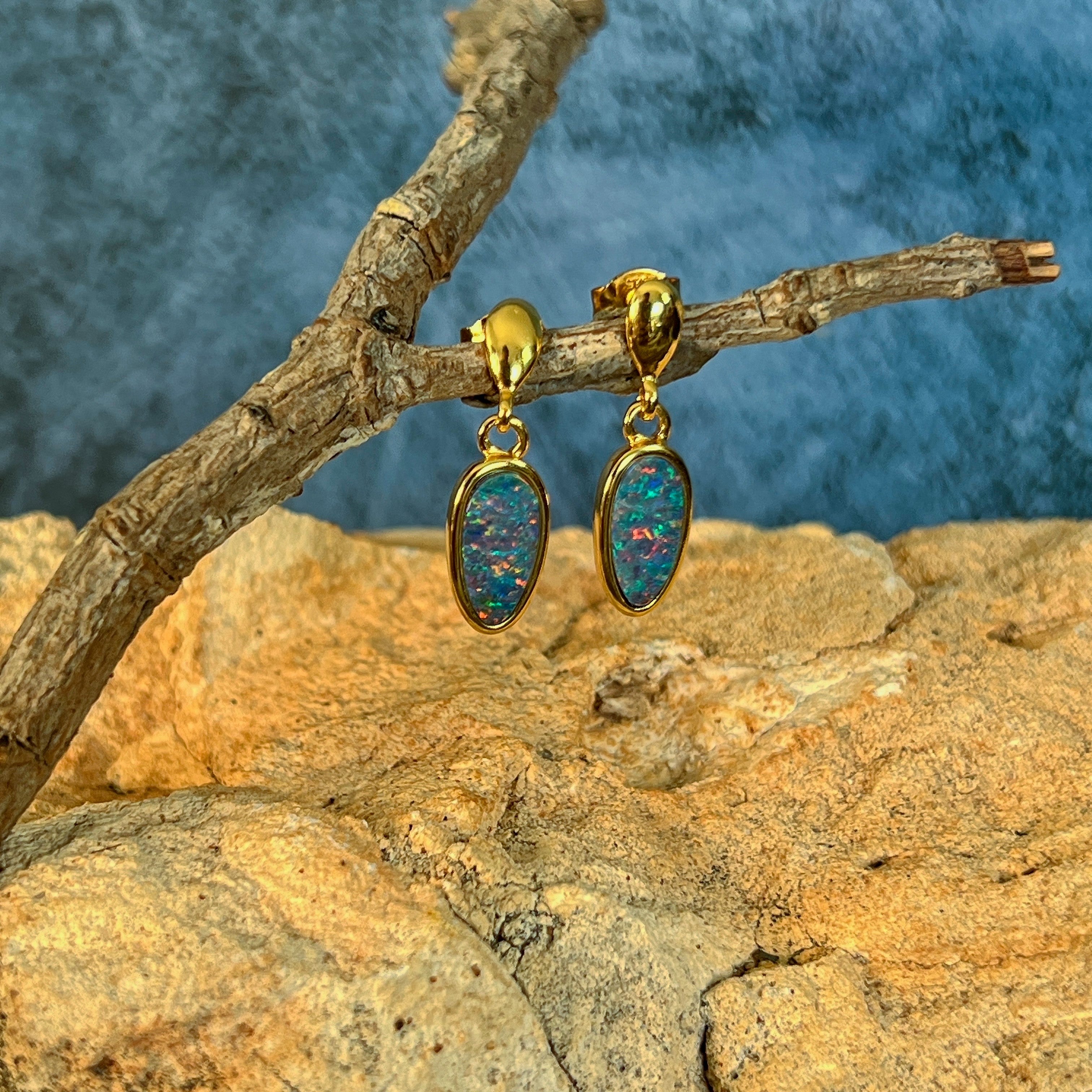 Australian opal doublet earrings, yellow gold-plated silver, 11 x 6mm stones showing red, pink, blue and green